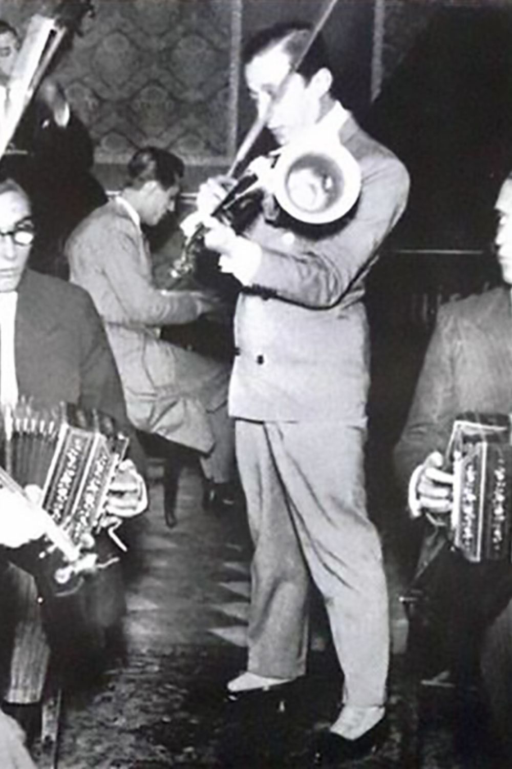 Carlos Gardel, legendary Argentine Tango singer, with musicians, colleagues and friends