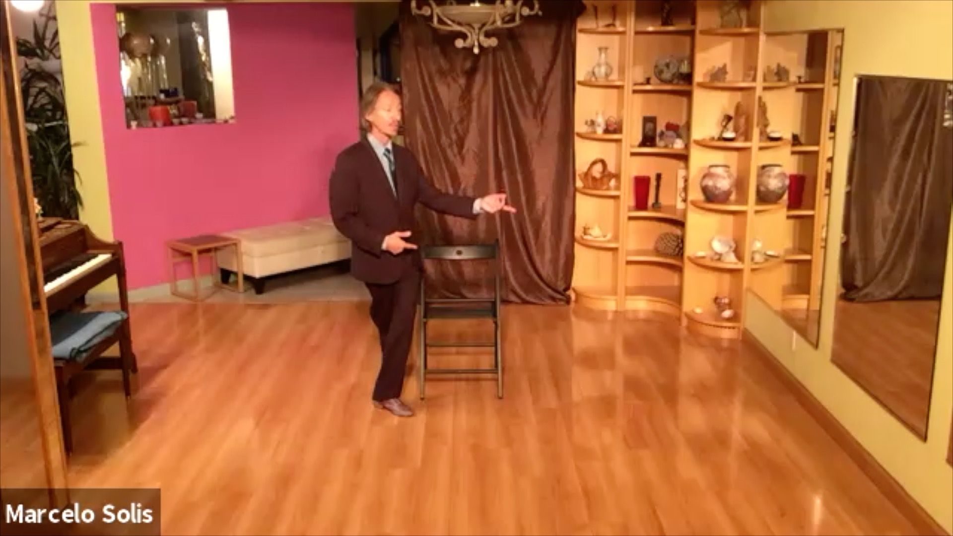 Marcelo Solis practicing Argentine Tango chair exercise