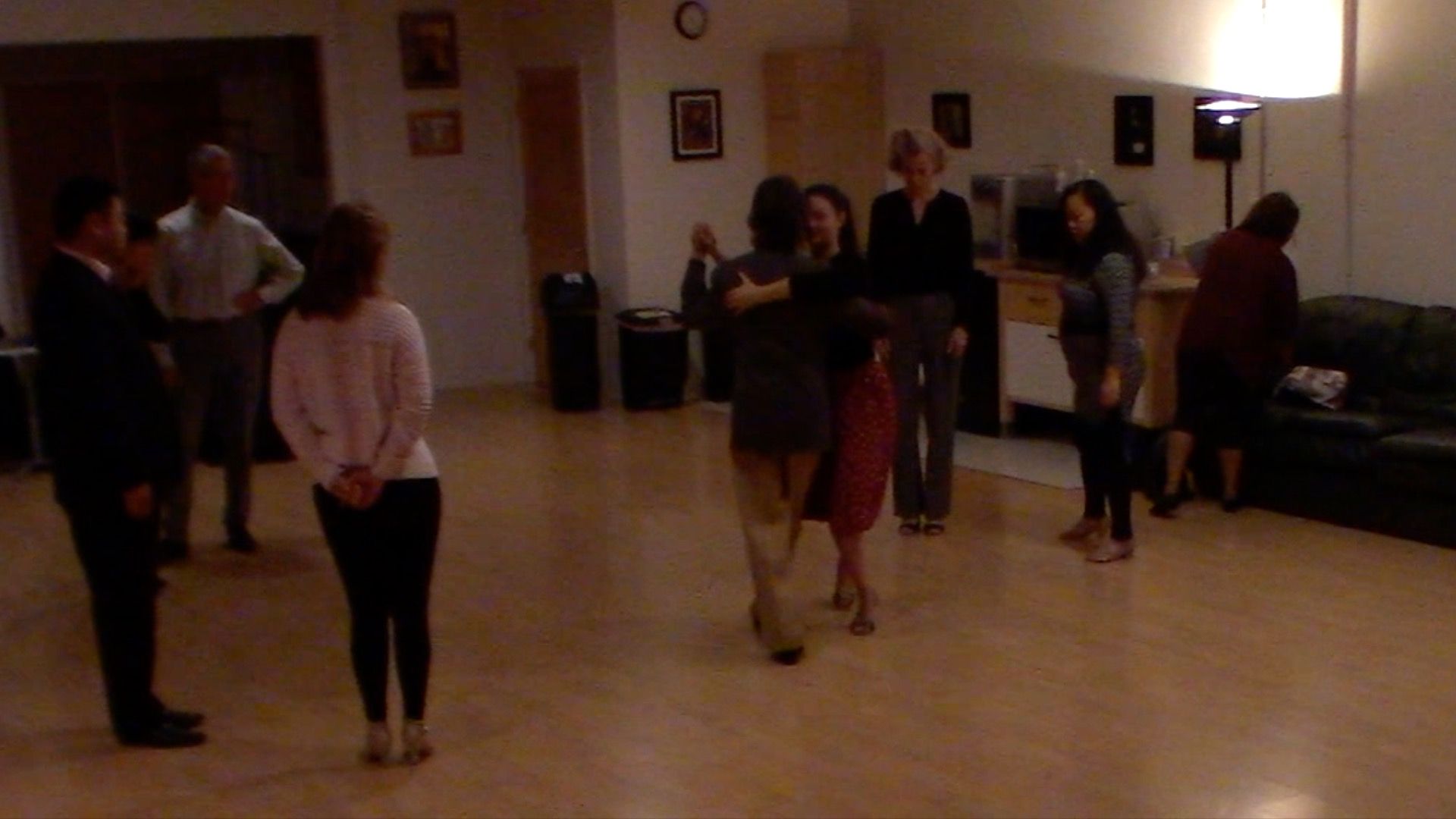 Argentine Tango dance with Miranda teaching backward ocho at beginner's class in San Francisco