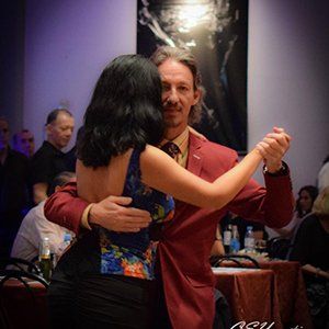 Marcelo Solis dancing Argentine Tango with Paulita at a milonga in Buenos Aires.