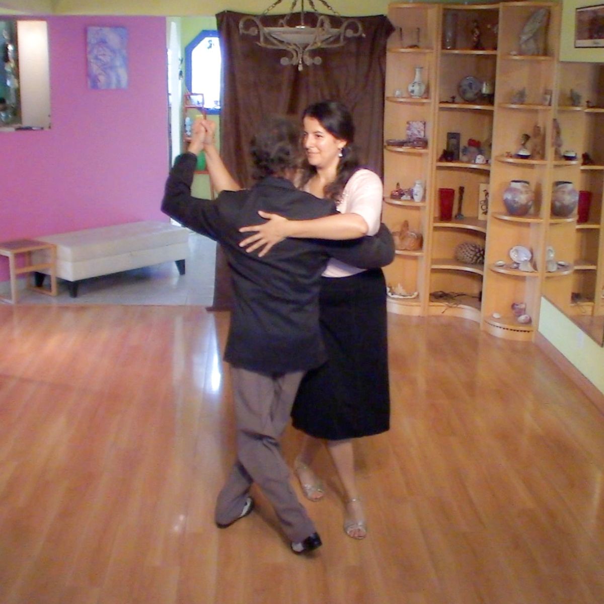 Marcelo Solis dancing Argentine Tango with Mimi at Escuela de Tango de Buenos Aires virtual classes.