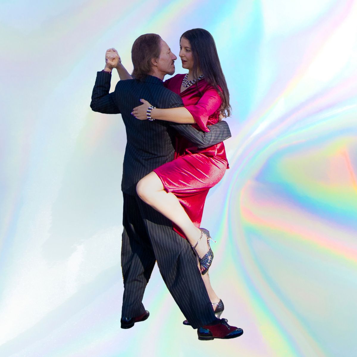 Marcelo Solis dancing Argentine Tango with Mimi on a colorful chrome light background