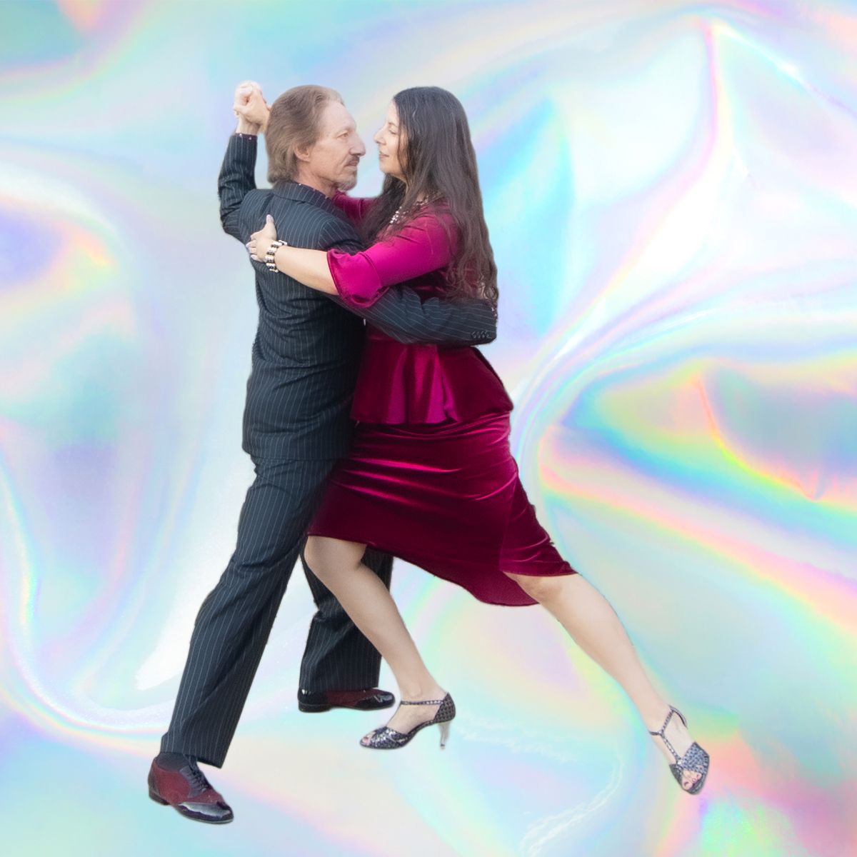 Marcelo Solis dancing Argentine Tango with Mimi on a colorful chrome light background
