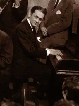 Osvaldo Pugliese playing the piano.