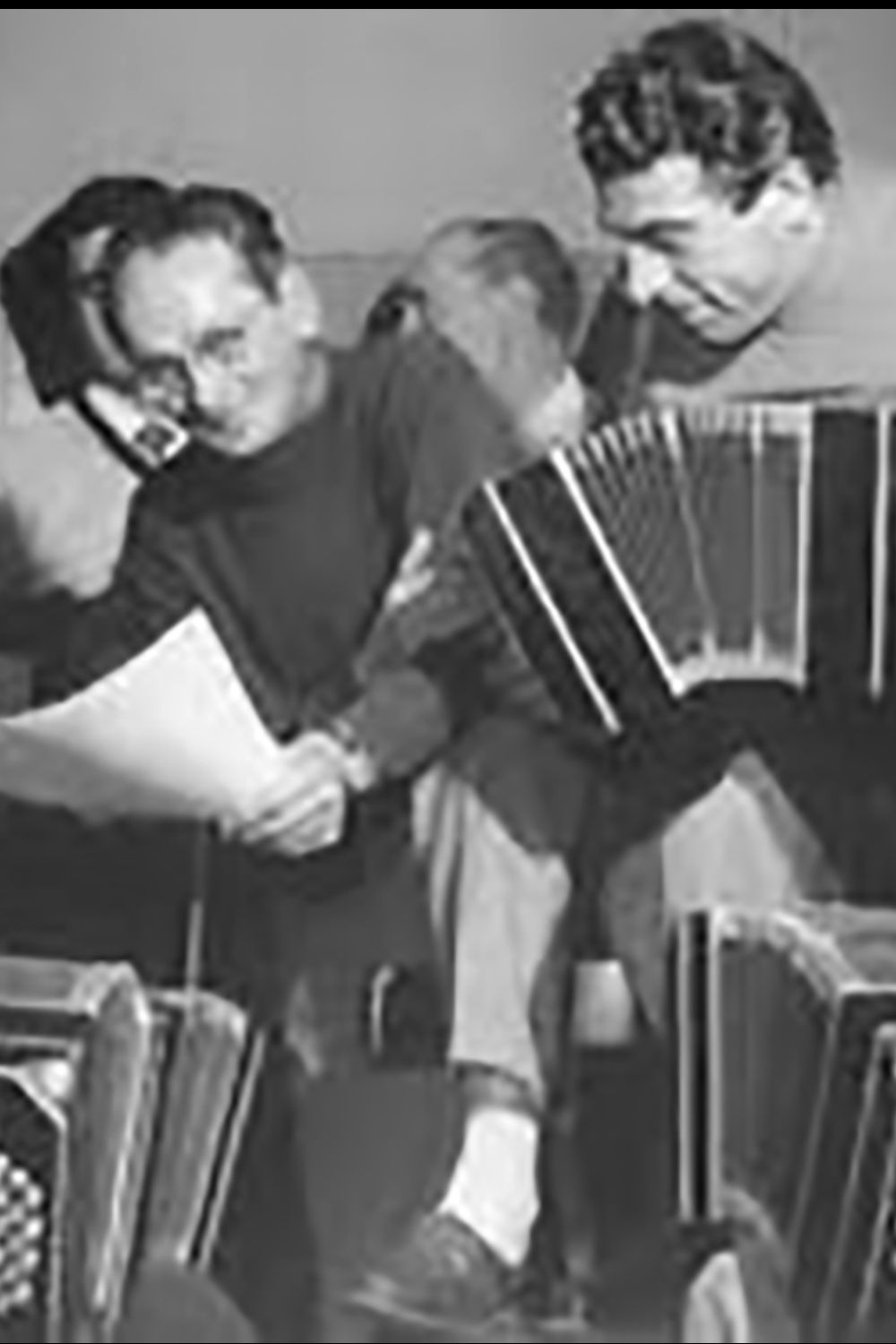 Osvaldo Ruggiero with Osvaldo Pugliese and other musicians of his Argentine Tango orchestra.